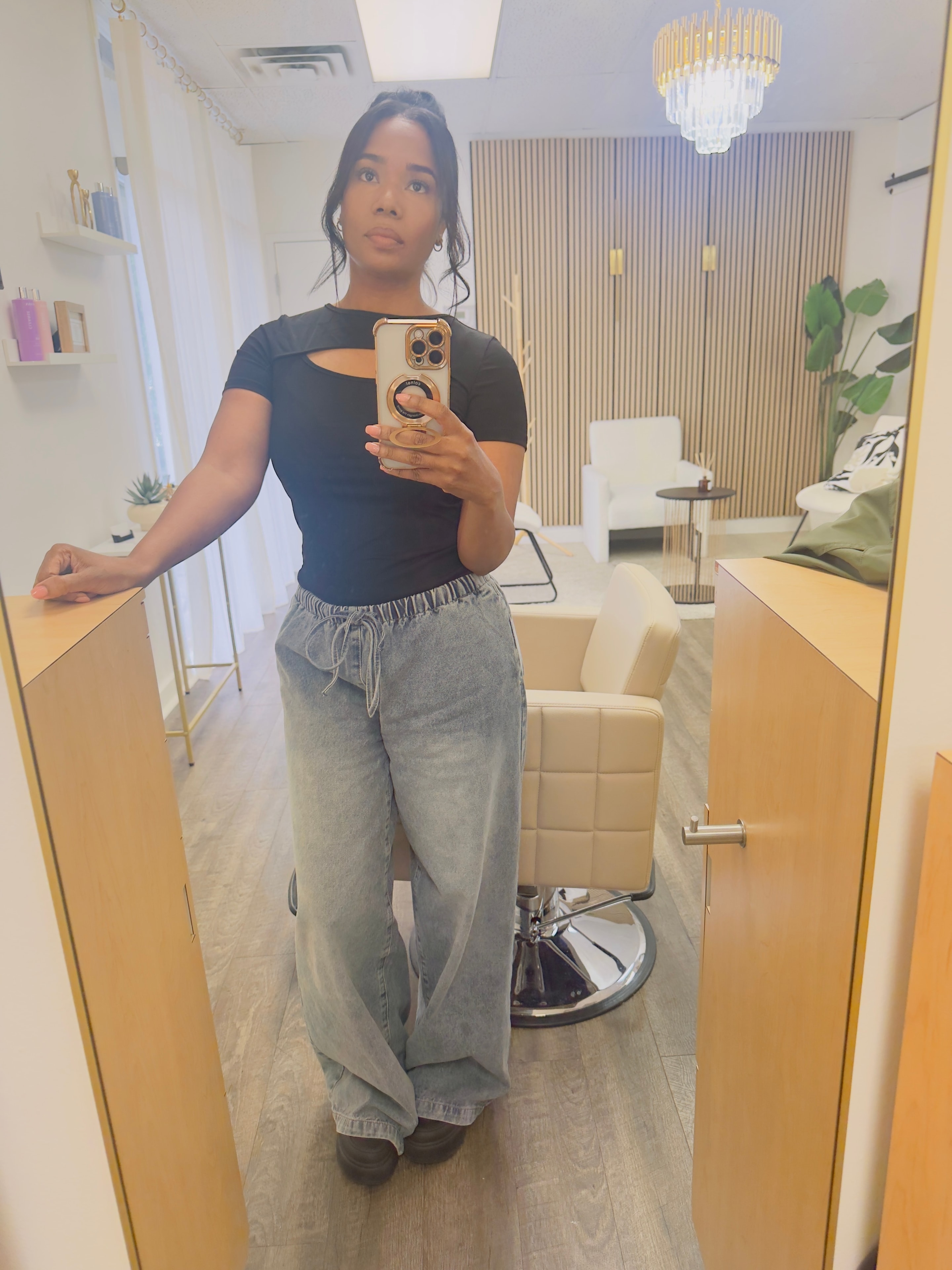 Attallah — lead stylist at Twisted Elegance Salon